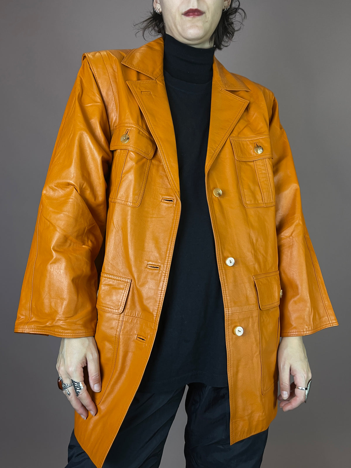 Lederjacke Orange Taschen Gürtel Gr. 40