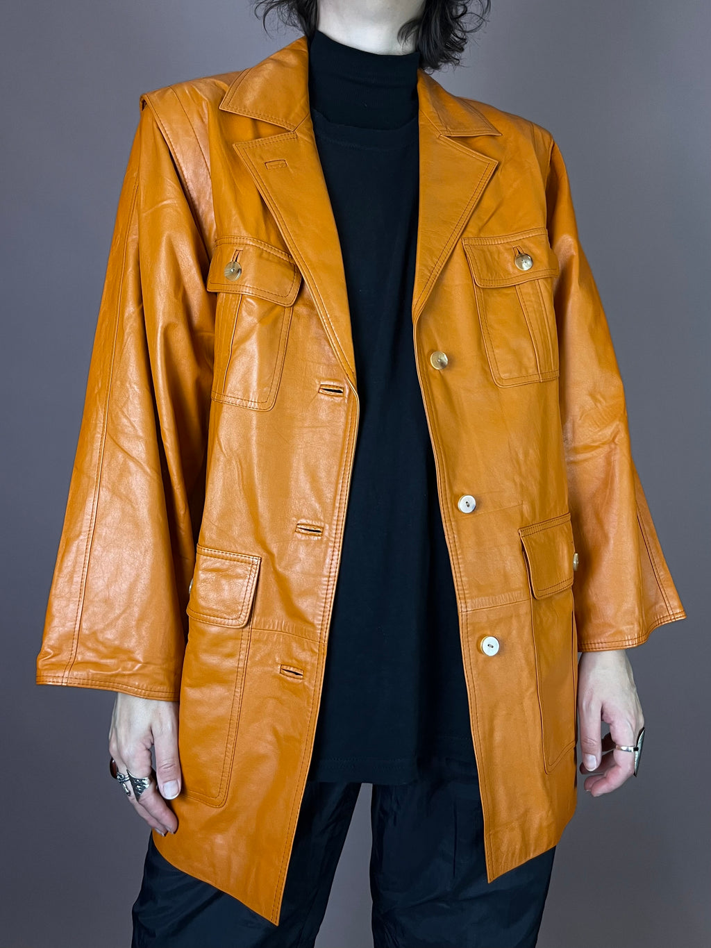 Lederjacke Orange Taschen Gürtel Gr. 40