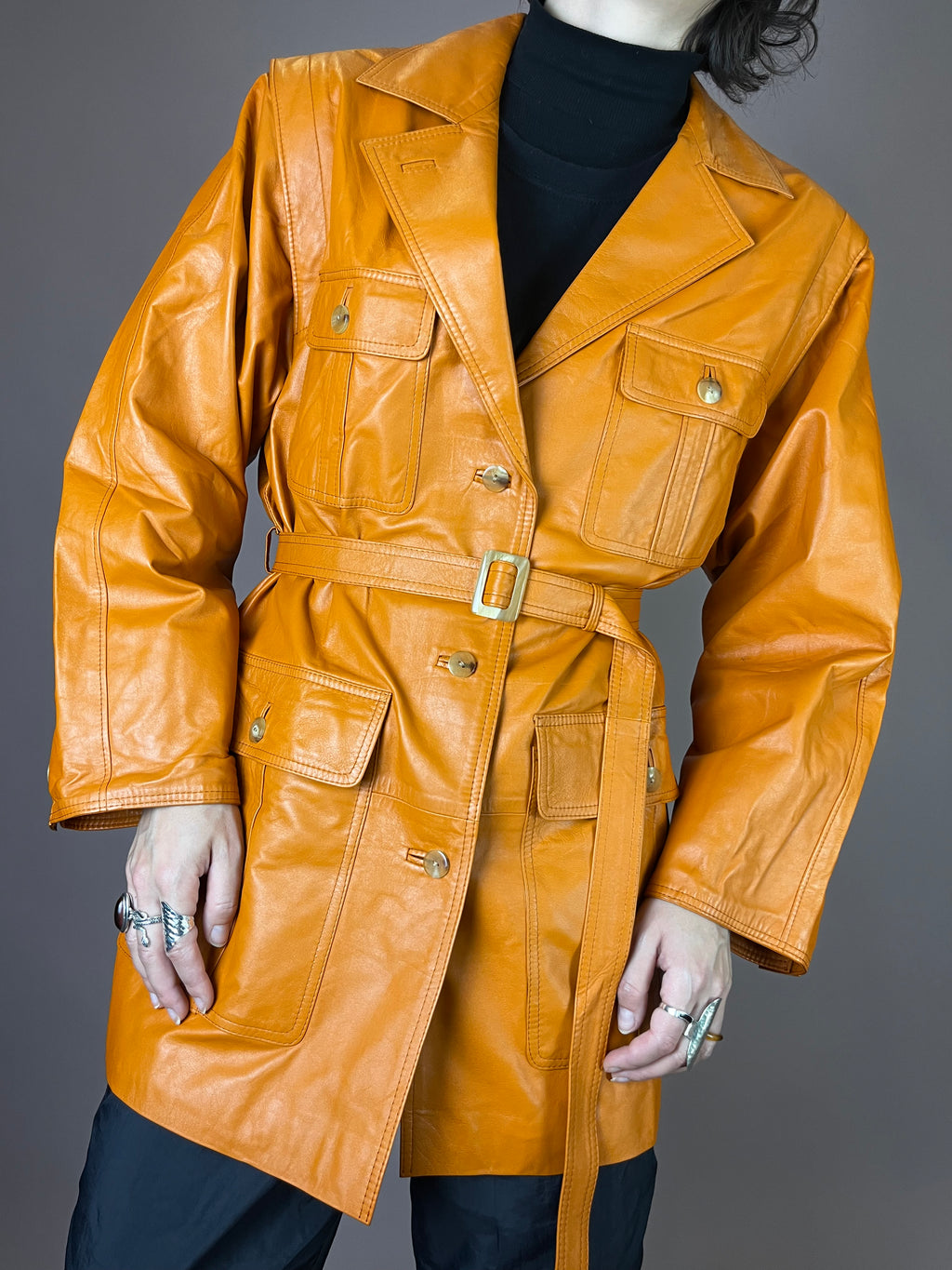 Lederjacke Orange Taschen Gürtel Gr. 40